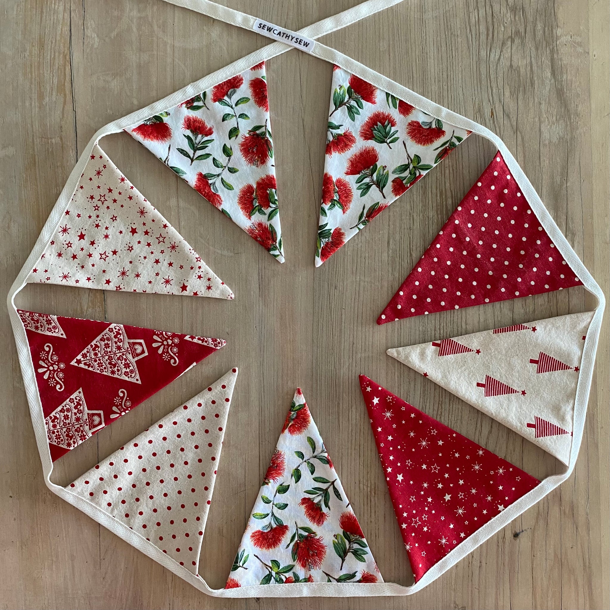 Christmas Bunting - Pōhutukawa, red and natural coloured fabrics